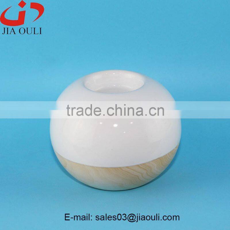 BSCI Audit Factory New design dimple ball shape White Ceramic tea light holders