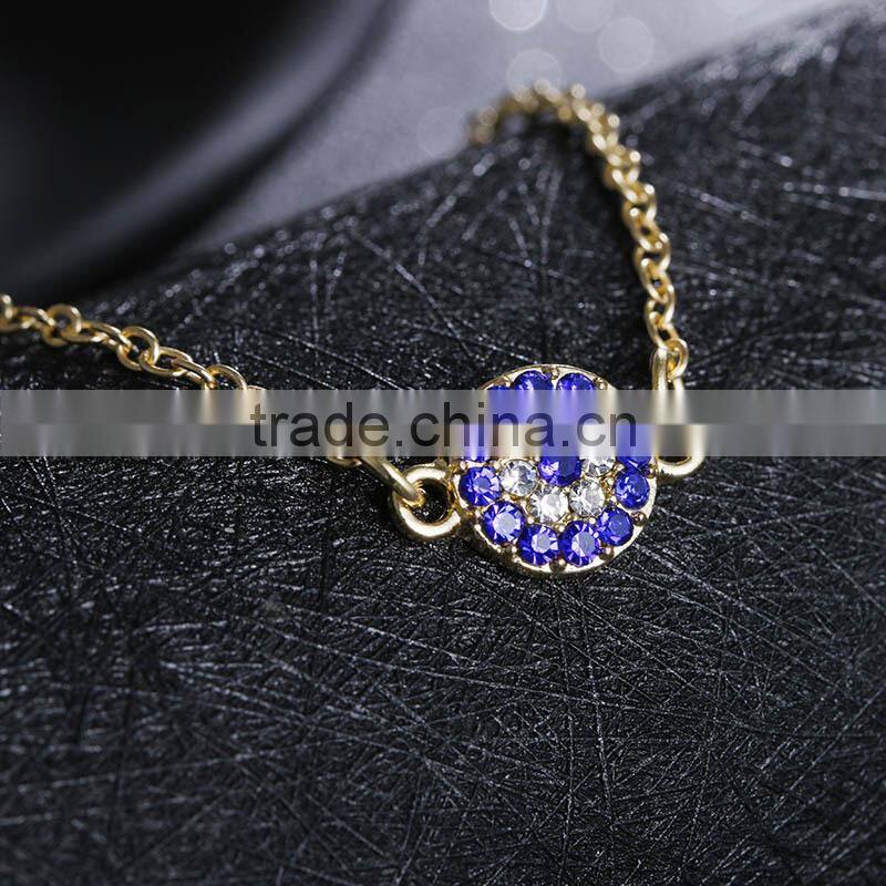 rhinestone evil eye charm gold chain bracelet