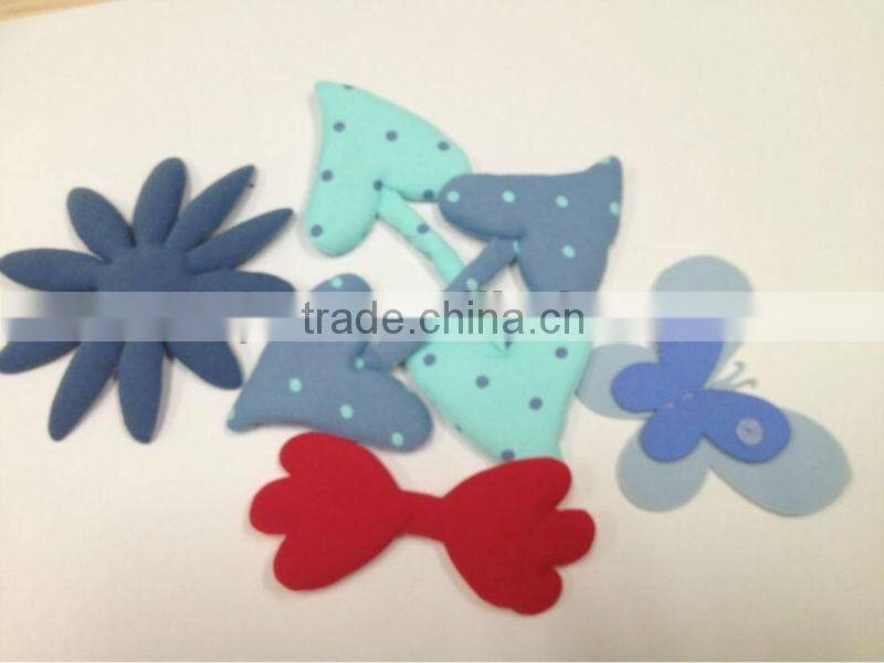 Ultrasonic embossed small foam flowers
