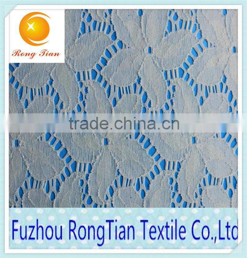 Wholesale cheap flower jacquard lace fabric for curtains
