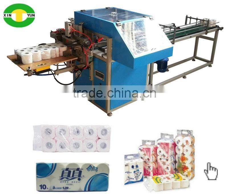 Simple operation multi rolls roll paper packing machine