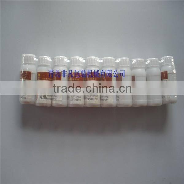 High Speed Automatic Pesticide Bottle Heat Shrink Packaging Machine