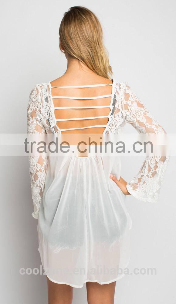 Beautiful lace front long sleeve lower back lace blouse