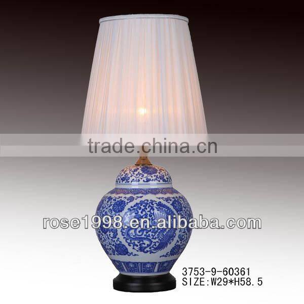 blue and white ceramic lamp with white chiffom shade
