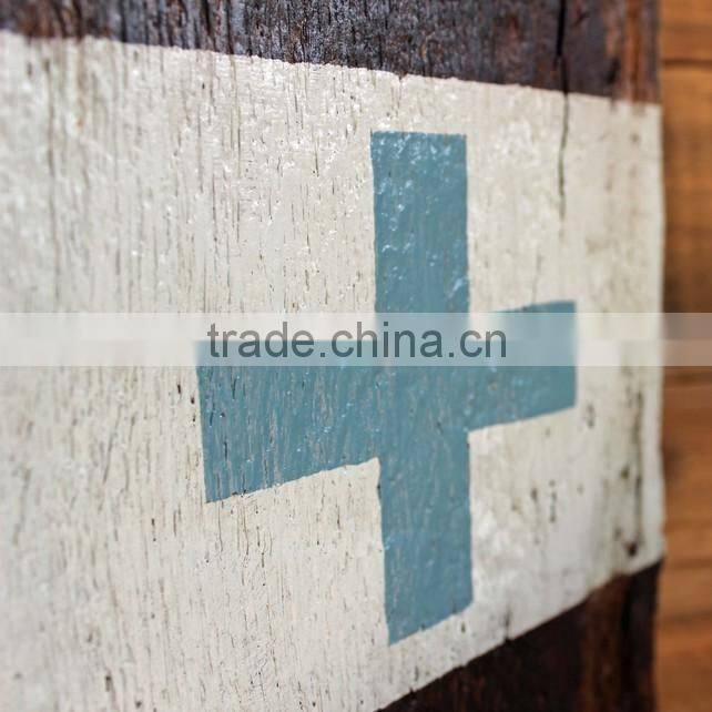 older aged wooden door stop