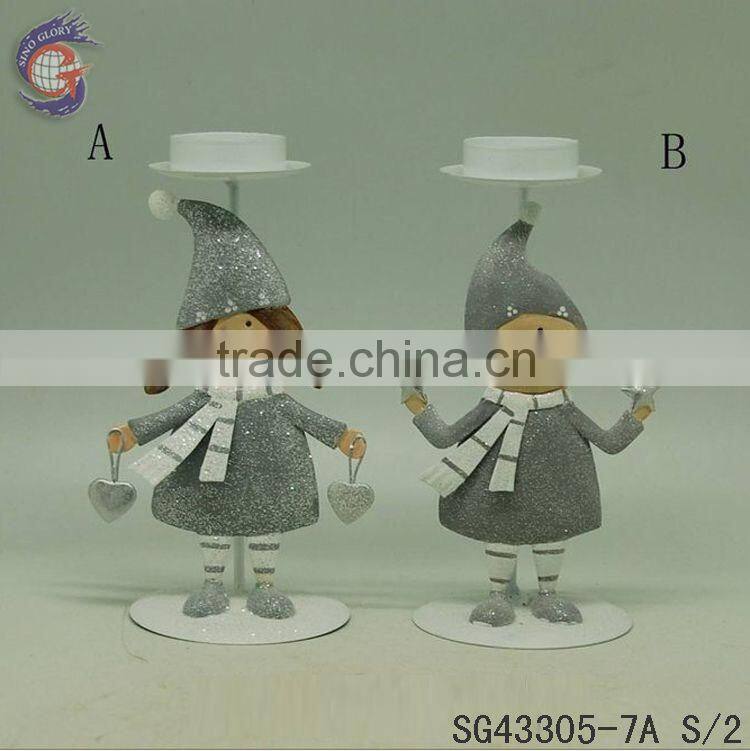 metal boy and girl with candle holder parts for decorating home