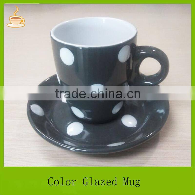 Samll size porcelain coffee mug with saucer set, black and green color glazed with white dots