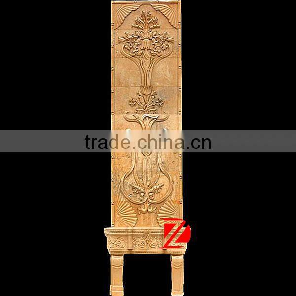 man made stone fireplace with relief