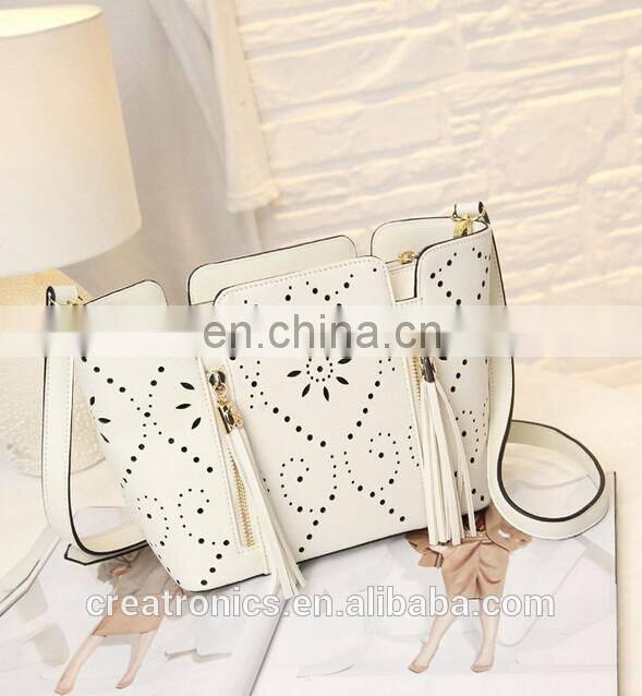 CR high reputation manufacture handbags latest model tassel bag long strap hollow pattern shoulder bag handmade leather bags
