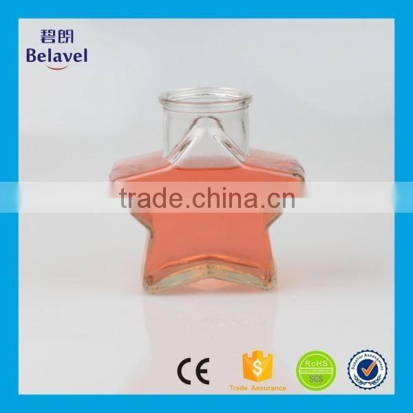 Hot sale star shape wedding decoration clear glass mini bottle