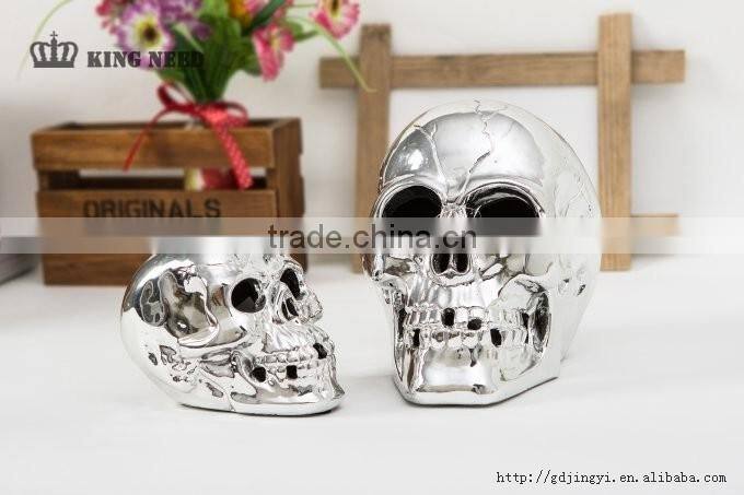 Silver plastic halloween skull head with LED light
