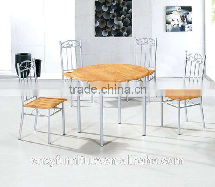 Foshan dining room furniture particleboard restaurant wooden round dining tables with 4 chairs