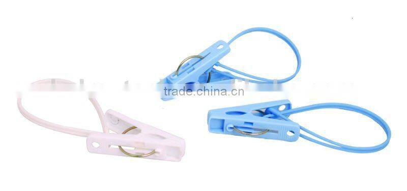 Small plastic rope clips pegs