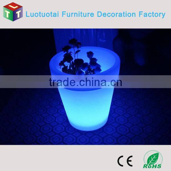 China manufacturer electric rotating flower pot with led lights for outdoor