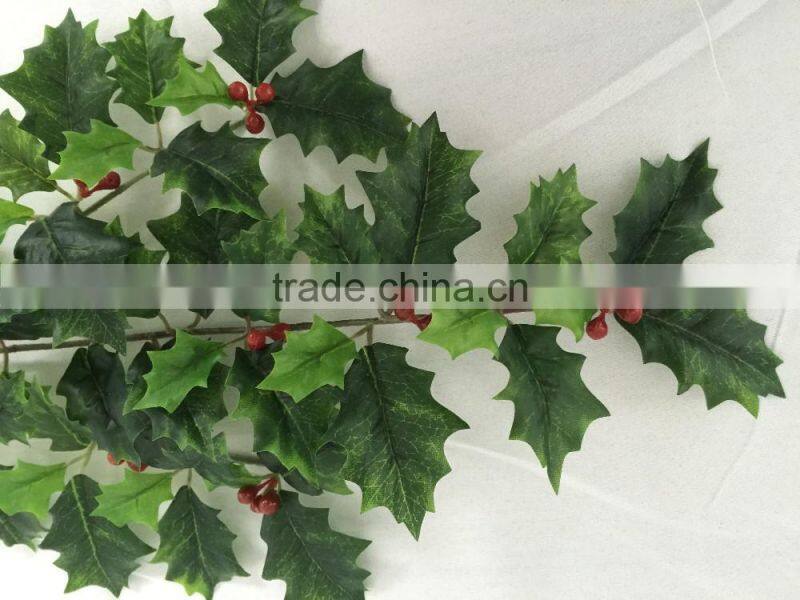 Artificial holly plant branch with red berries