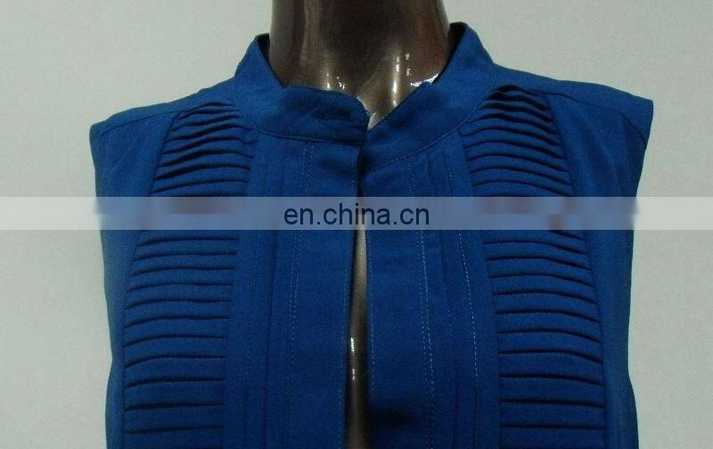 Woman's classic pleated front button open shirt dress made of chiffon crepe