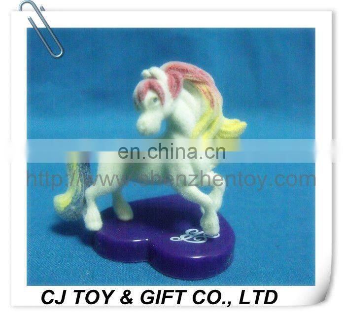 toy horse flocked