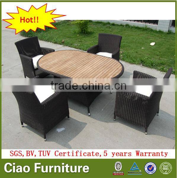 Luxury dining room furniture teak wood table and rattan chair