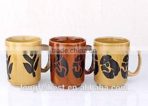 Hand-painted small ceramic cup and saucer, color decal