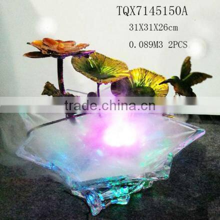 misting bronze water fountain with metal leaf