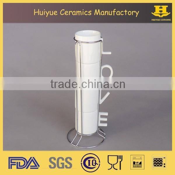 White ceramic tea cup set with metal stand, bone china cup