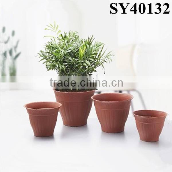 Round garden colored plastic flower pots