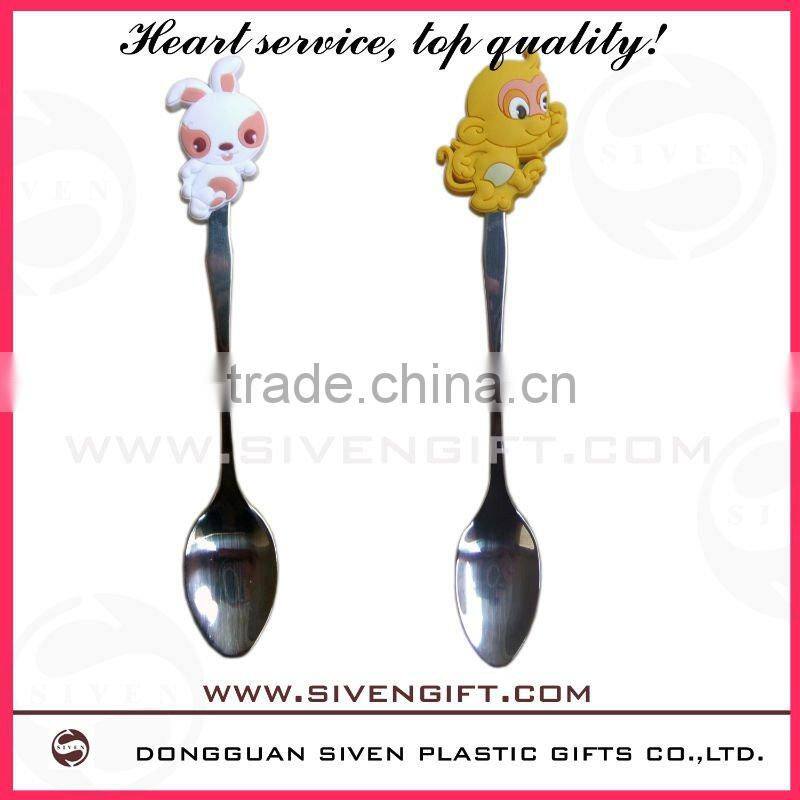 cute spoon for kids made of pvc cover and stainless steel