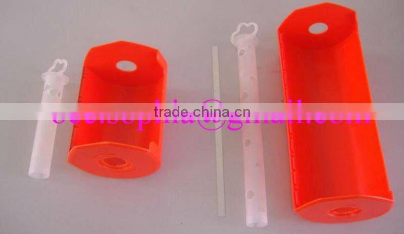 Pre-taped masking film dispenser cutter