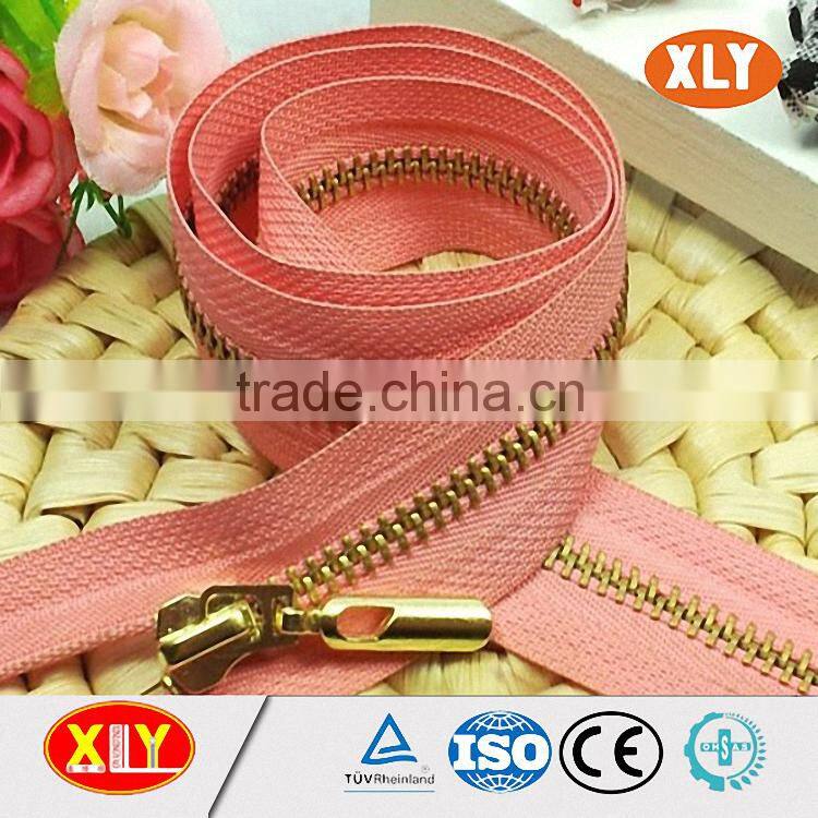 shenzhen xly wholesale yellow polyester tape copper teeth metal zipper