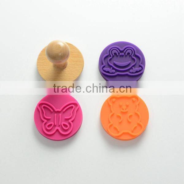 Hot selling food grade silicone cookie stamp with wooden handle
