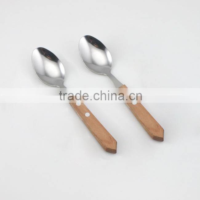 Carving wooden spoons