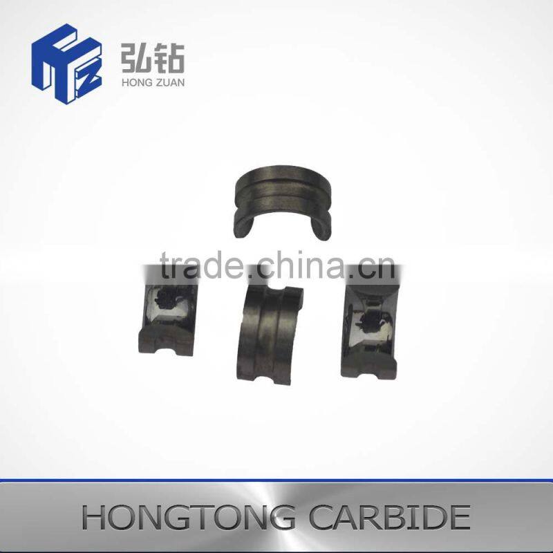 Tungsten carbide halfmoon buncher guide
