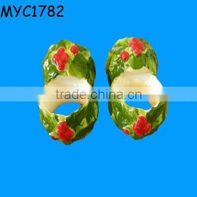 White ceramic napkin ring vase