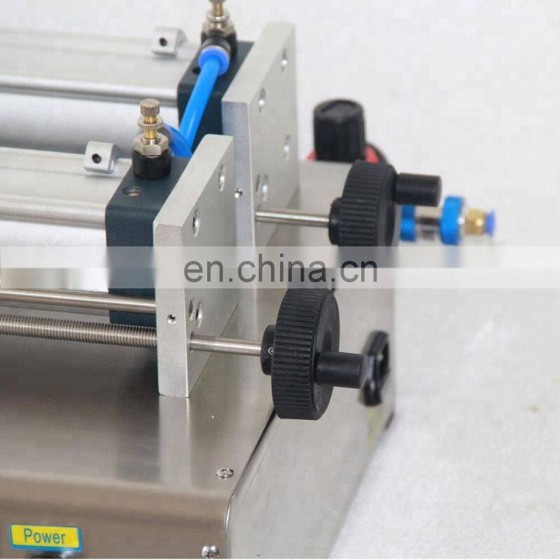 JOYGOAL hot sale high quality manual piston liquid filling machine with two filling heads