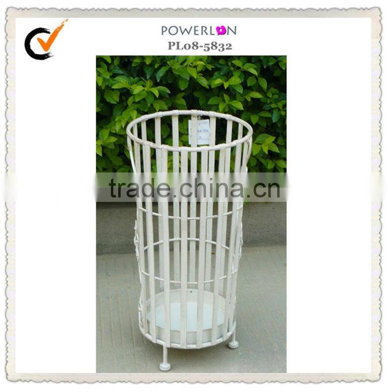 White metal indoor umbrella holder