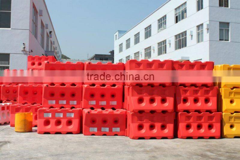 Plastic water filled road barrier three holes