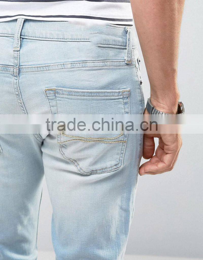 New Fashion Stretch Slim Jeans With Rips In Mid Wash for man
