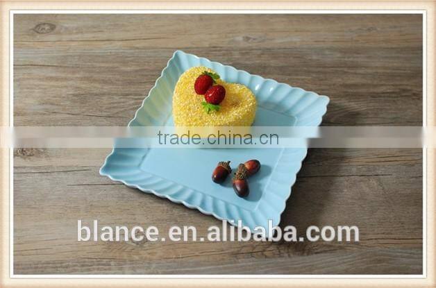 colorful dinner plates set in square shape