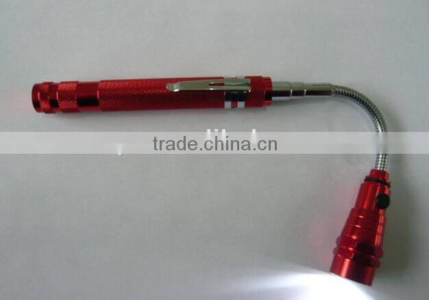 LED flashlight with telescopic magnetic pick-up tool
