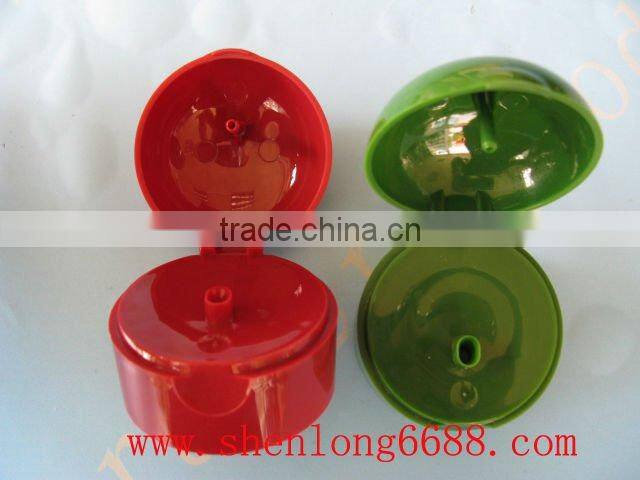 black plastic shampoo bottle flip top cap