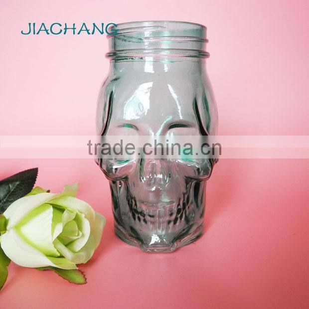 blue skull shape glass beverage coffee jar with blue tin lid
