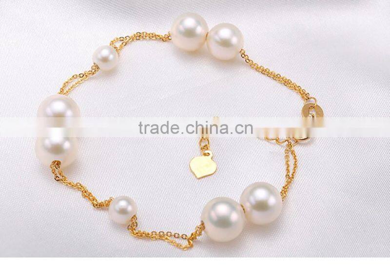 akoya cultured pearls bracelet with white/golden pearls in 18k gold chain