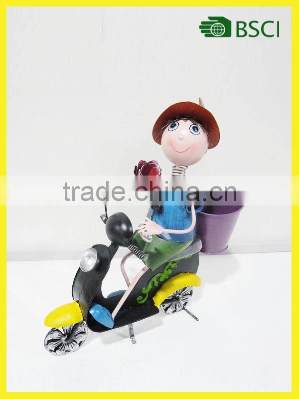 Cute arts craft Metal boy with motorcycle