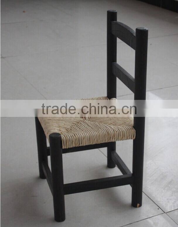 beautiful solid wood chair with ratten weave for children