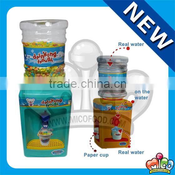 colorful fruit candy in water fountain toy