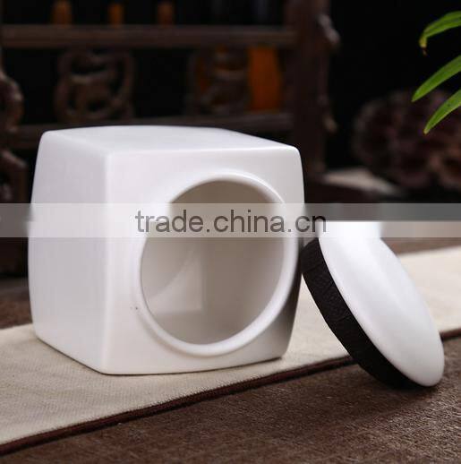 White galazed ceramic funeral pet ashes urns