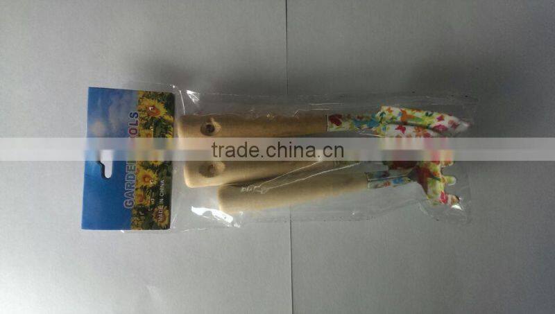 printing garden tool with wooden handle