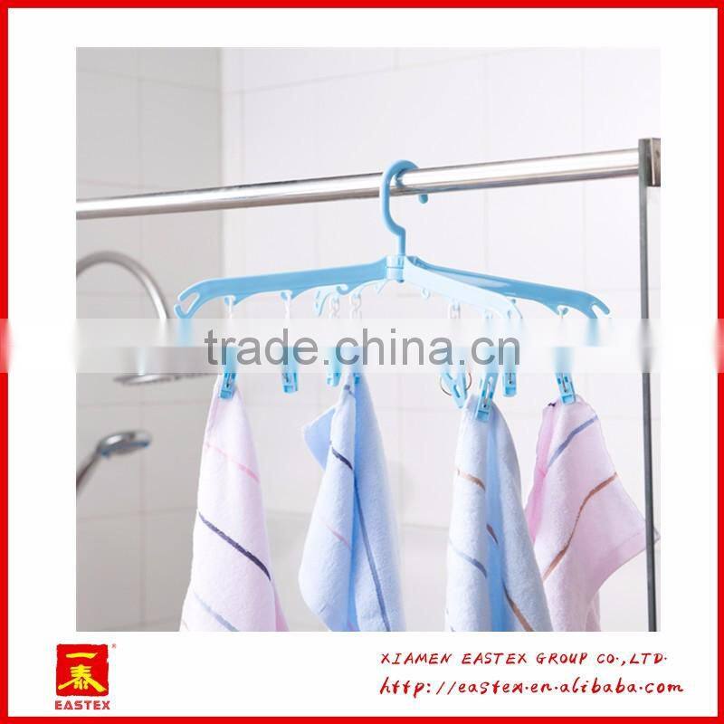 Rotatable clothes hanger rack with 8 clips