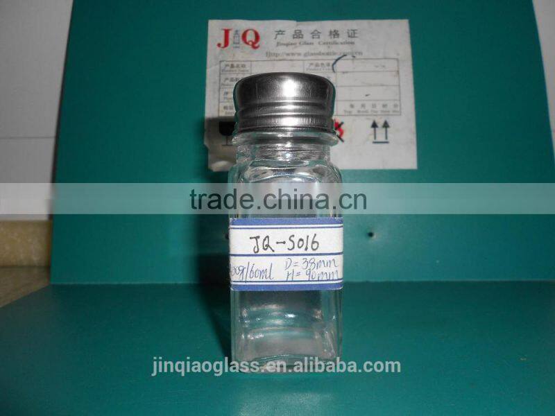 different glass spicy jar with cap