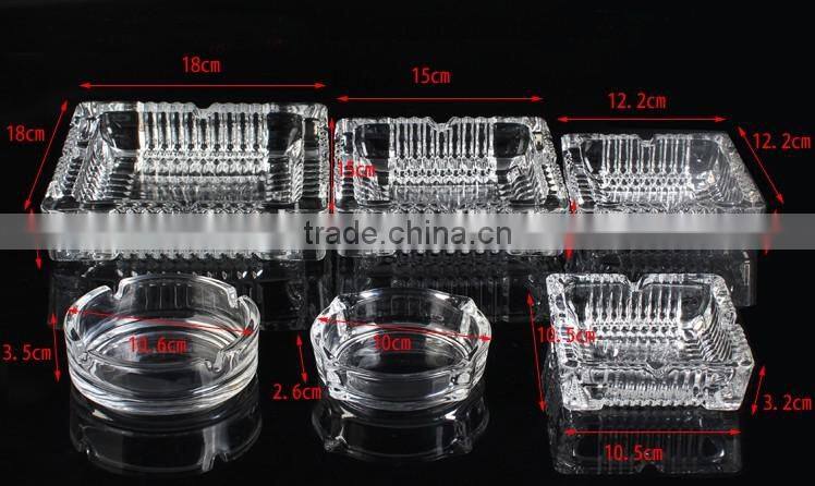 clear glass ashtray with different size square and round shape